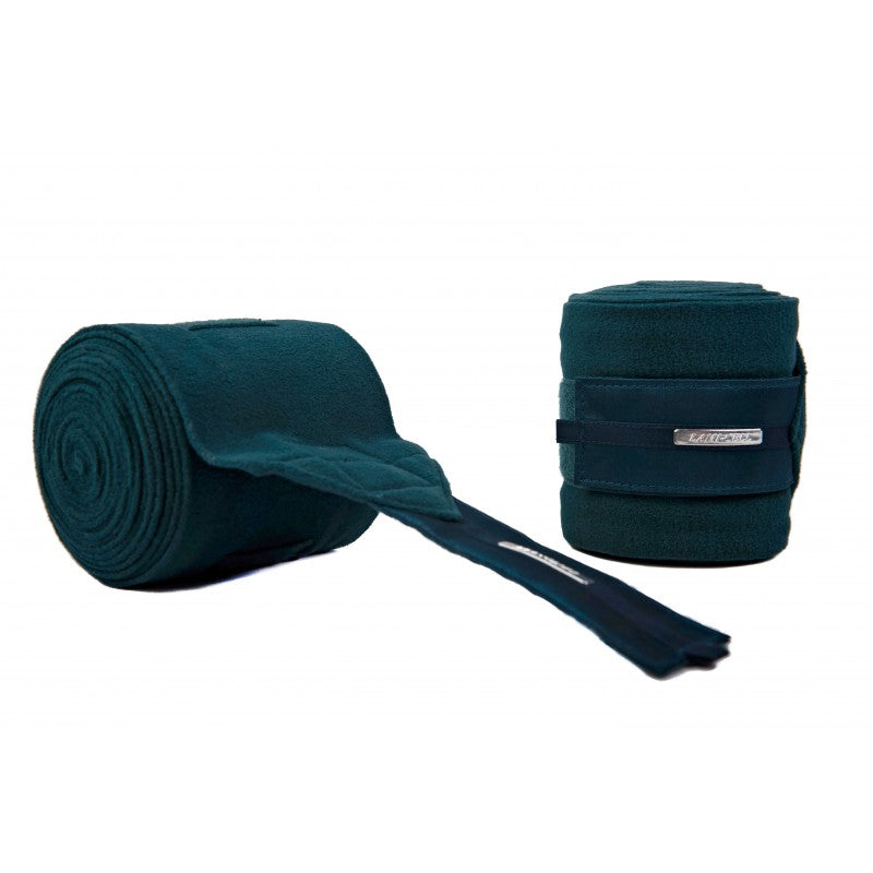 Lami-Cell Aurora blue polo bandages stacked in stable – anti-pilling fleece horse leg bandages at Ekkivibes