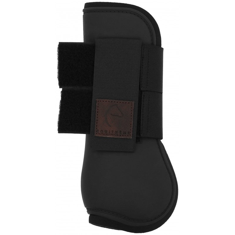 Black horse wearing Equitheme Tara burgundy tendon boots in arena – anatomical neoprene horse boots at Ekkivibes